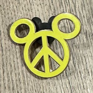Disney’s Mikey peace sign pin